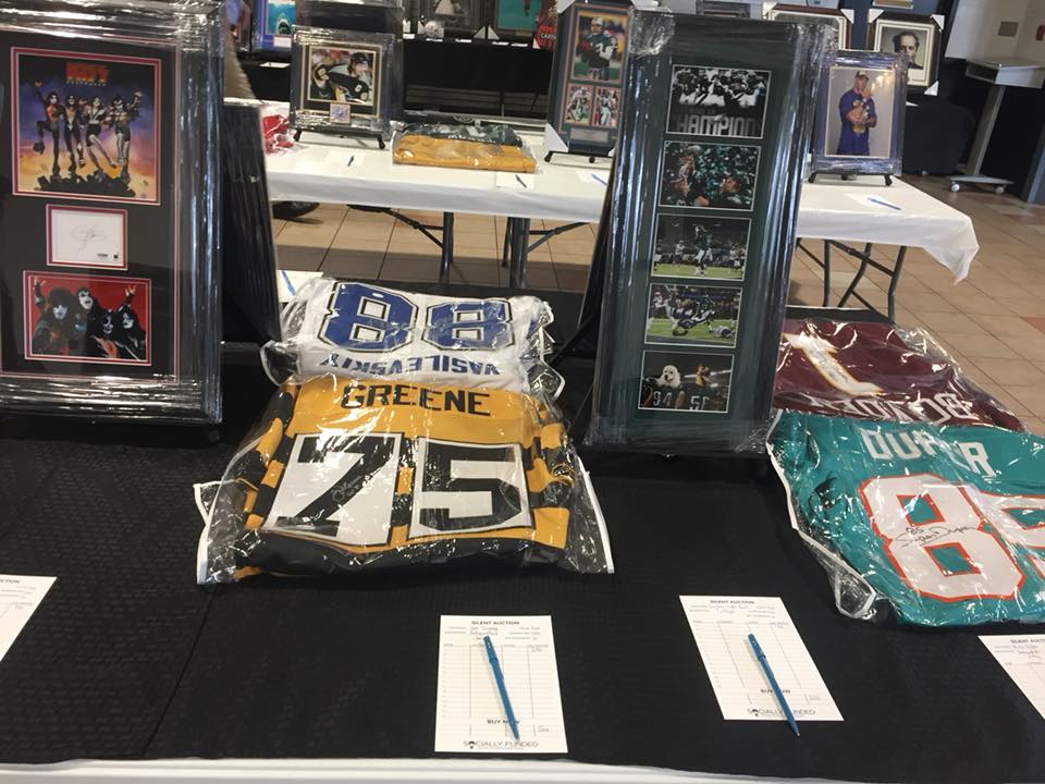 Auction items from The Propeller Club of Tampa Bay’s ‘Shrimperoo’ fundraiser